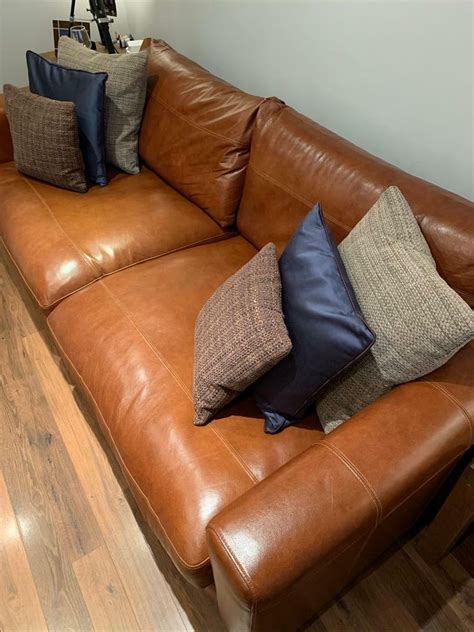 reduced large tan leather sofa  seater  pengam green