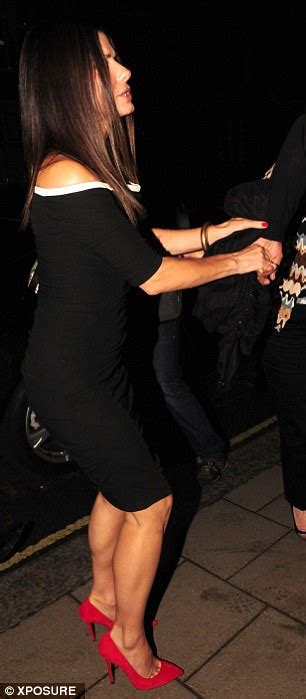 sandra bullock sizzles in london as she dons sexy slit black dress with