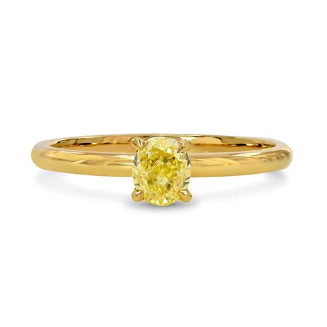 fancy intense yellow oval diamond ring sku  ct