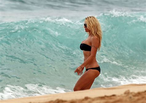 Pamela Anderson Busty Wearing Strapless Black Bikini On A