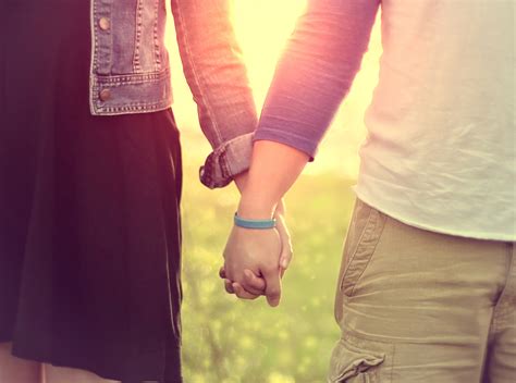 photo couple walking hand  hand action relaxation sun