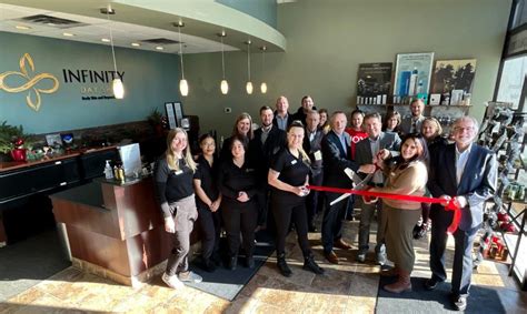 ribbon cutting  infinity day spa apple valley chamber  commerce