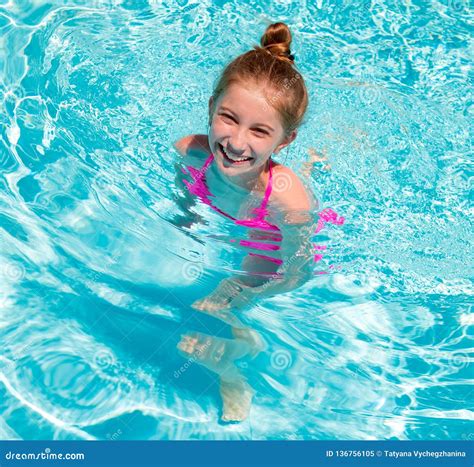 teen girl  swimming pool squinting  eyes stock image image  pool active