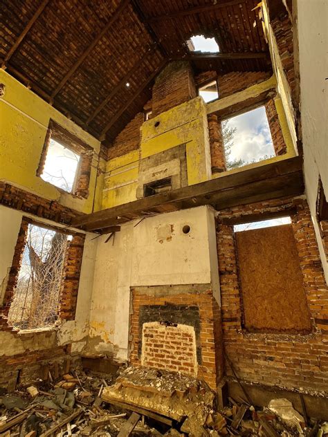 abandoned farmhouse bright yellow room  occupied