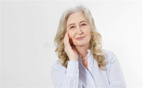 closeup of smiling senior woman wrinkle face and gray hair old mature