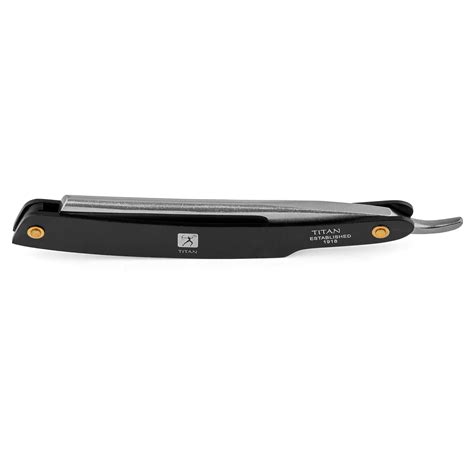 black and stainless steel straight razor in stock titan