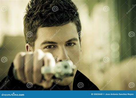man aiming  camera stock photo image  angry aiming