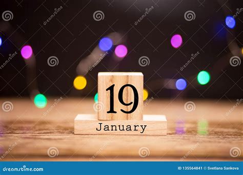 january  day   month calendar  wooden background winter