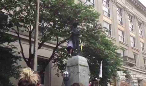 Watch Protesters In Durham Pull Down Confederate Statue