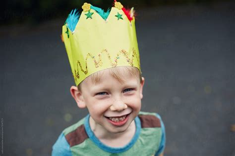 happy smiling child wearing  crown  stocksy contributor sally anscombe stocksy