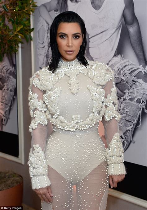 kim kardashian turned heads in a see thro gh gown at the fashion los