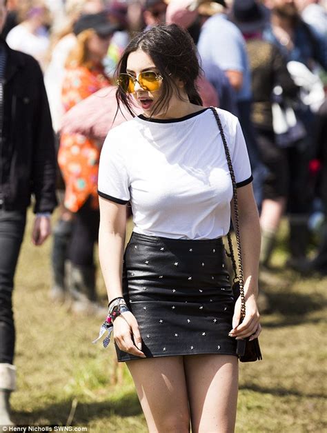 charli xcx shows off shapely legs in short leather skirt at glastonbury festival daily mail online