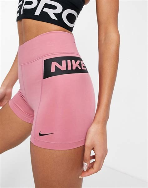 Nike Pro Training Booty Shorts With Logo Taping In Pink Asos
