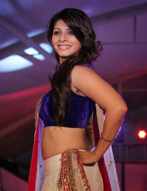 tanisha mukherjee hot navel pics cute armpit show in white purple designer lehenga choli