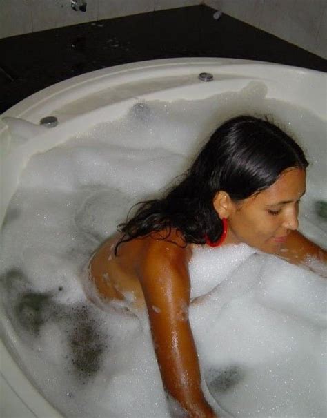 a naked latina chick in bed and in the bathtub pichunter