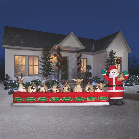 Gemmy Christmas Inflatable â€” Santa Feeding 8 Reindeer Gemmy Christmas