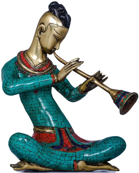 musician playing shehnai
