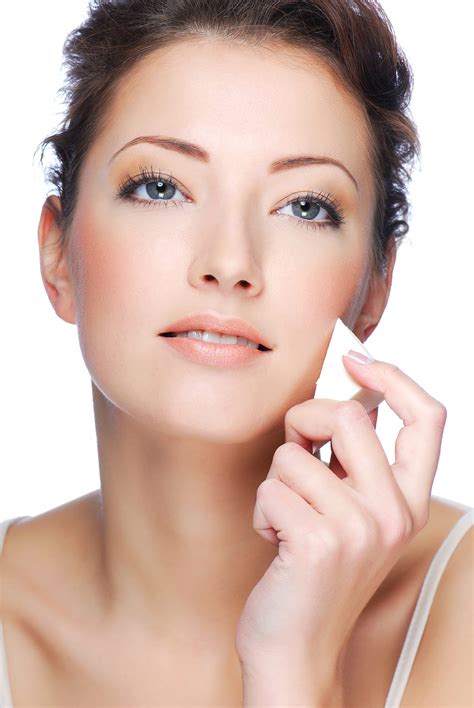 bigstockapplyingfaceandbody cosmetic skin care specialist