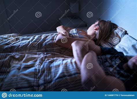 Couple Fighting And Lying In Bed Arms Folded Marriage With Conflict