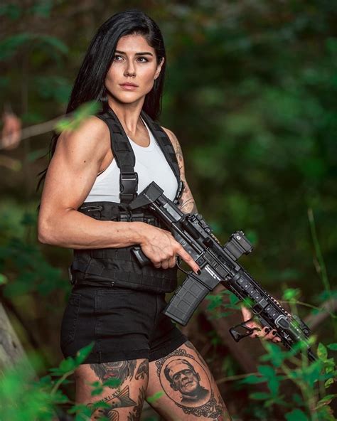 inked and armed military girl army girl girl guns