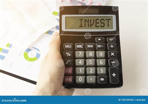calculator   inscription invest     stack  documents stock image