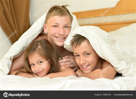 Sister Under Blanket