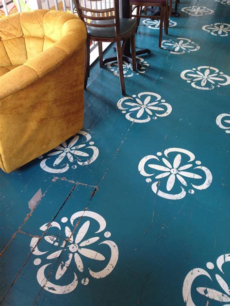 top  stencil  painted rug ideas  wood floors