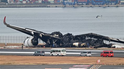 japan investigators probe conflicting reports  plane crash