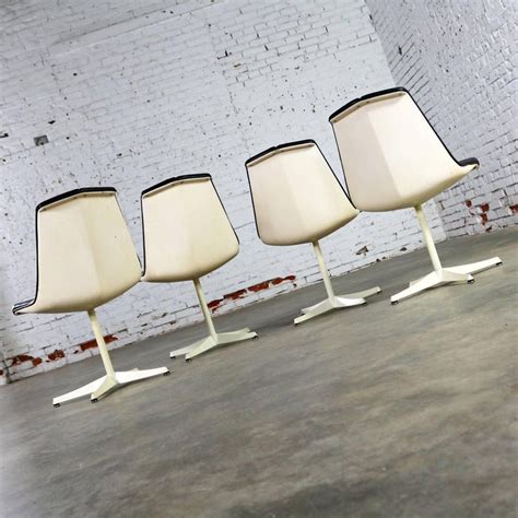 set of four richard schultz stacking dining chairs for