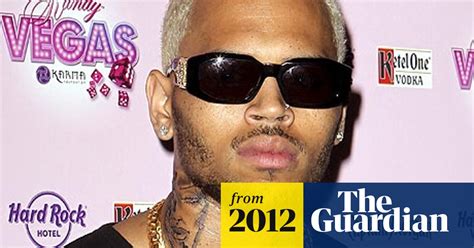 Chris Brown Denies His New Tattoo Depicts A Beaten Rihanna Chris
