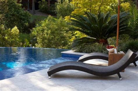 make your backyard feel like a resort pool craft inc