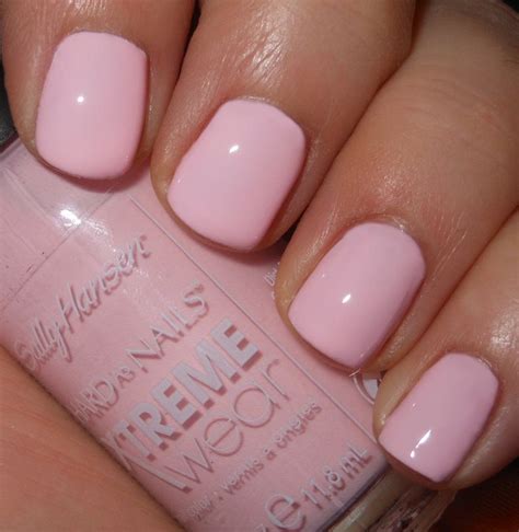 sally hansen tickled pink imperfectly painted blush pink nails
