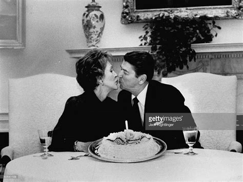 president ronald reagan kissing wife nancy in the white house nancy