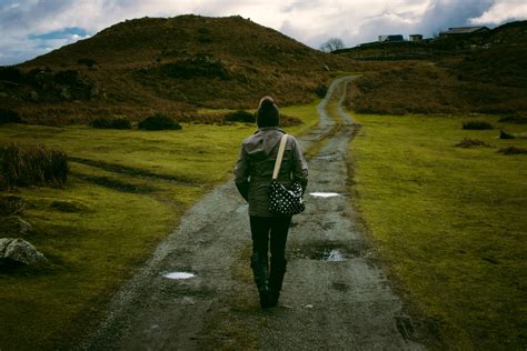 person walking   path   bag image  stock photo