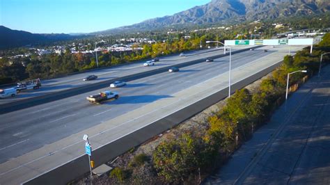 stock drone footage  freeway pan  mountains