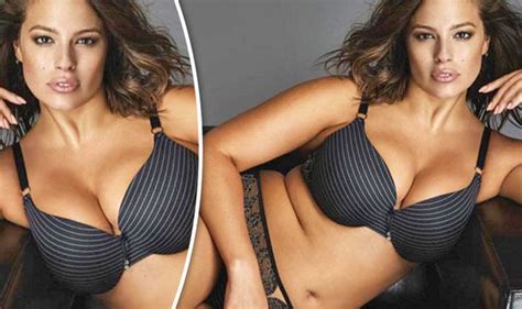 ashley graham squeezes large assets into racy lingerie for