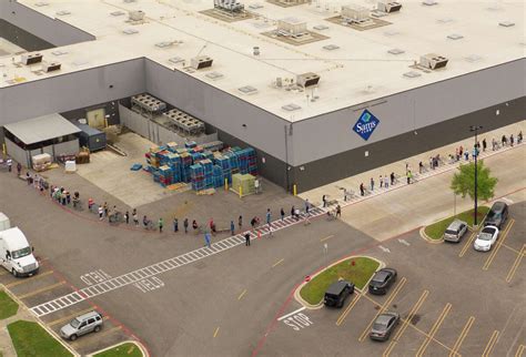 people  waiting  hours drone photo shows long  wrapped  local sams club