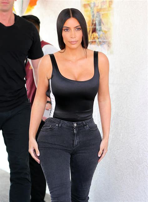 kim kardashian s hourglass figure in tight black jeans