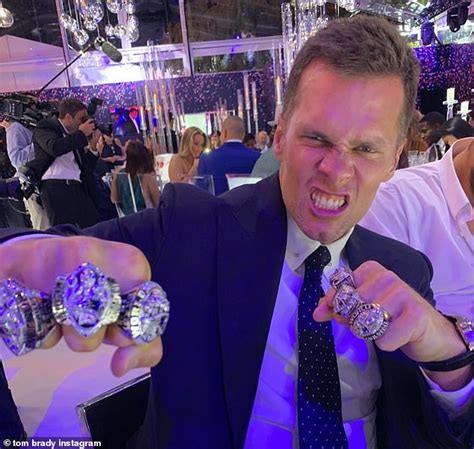 tom brady celebrates six super bowl championship rings then poses