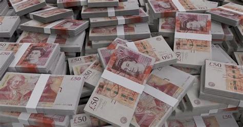 british pounds sterling banknote bundles scattered stock video