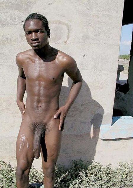 fat black guy exposing his massive prick by stripping down his pant hood tube