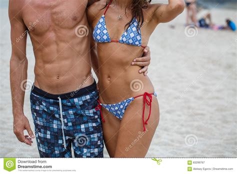 Woman And Man Torso On The Beach Stock Image Image Of