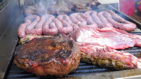 italy street food festival huge asado blocks of meat on