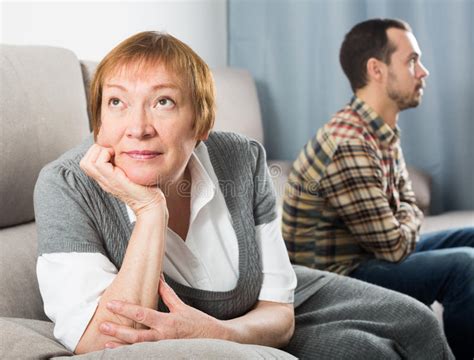 Elderly Mother And Adult Son Are Offended At Each Other Because Of The