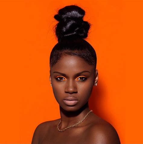 melanin x color ny photographer poses black women against colored backdrops for stunning photo