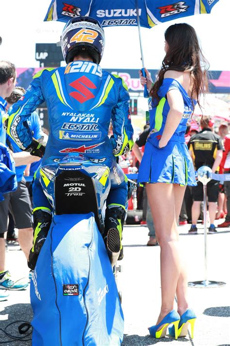 Grid Girl Traditionally Hold Umbrella Over Racer