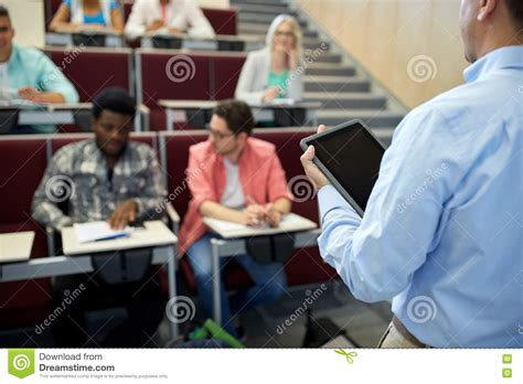 teacher  tablet pc  students  lecture stock image image  gadget international