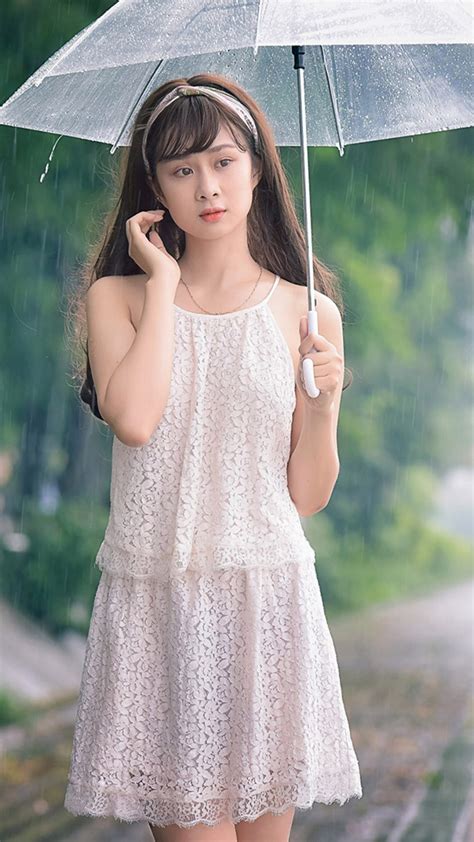 cute asian girl posing in rain 4k mobile wallpaper