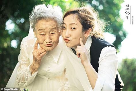 woman poses for wedding photos with her grandmother in place of her