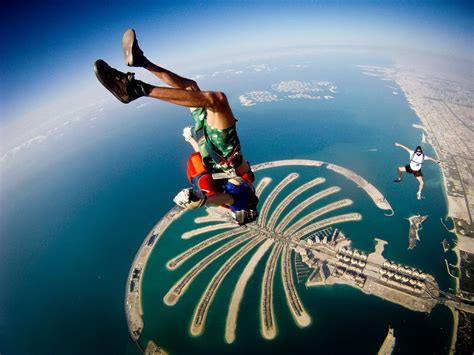 man flying   air  riding  parachute
